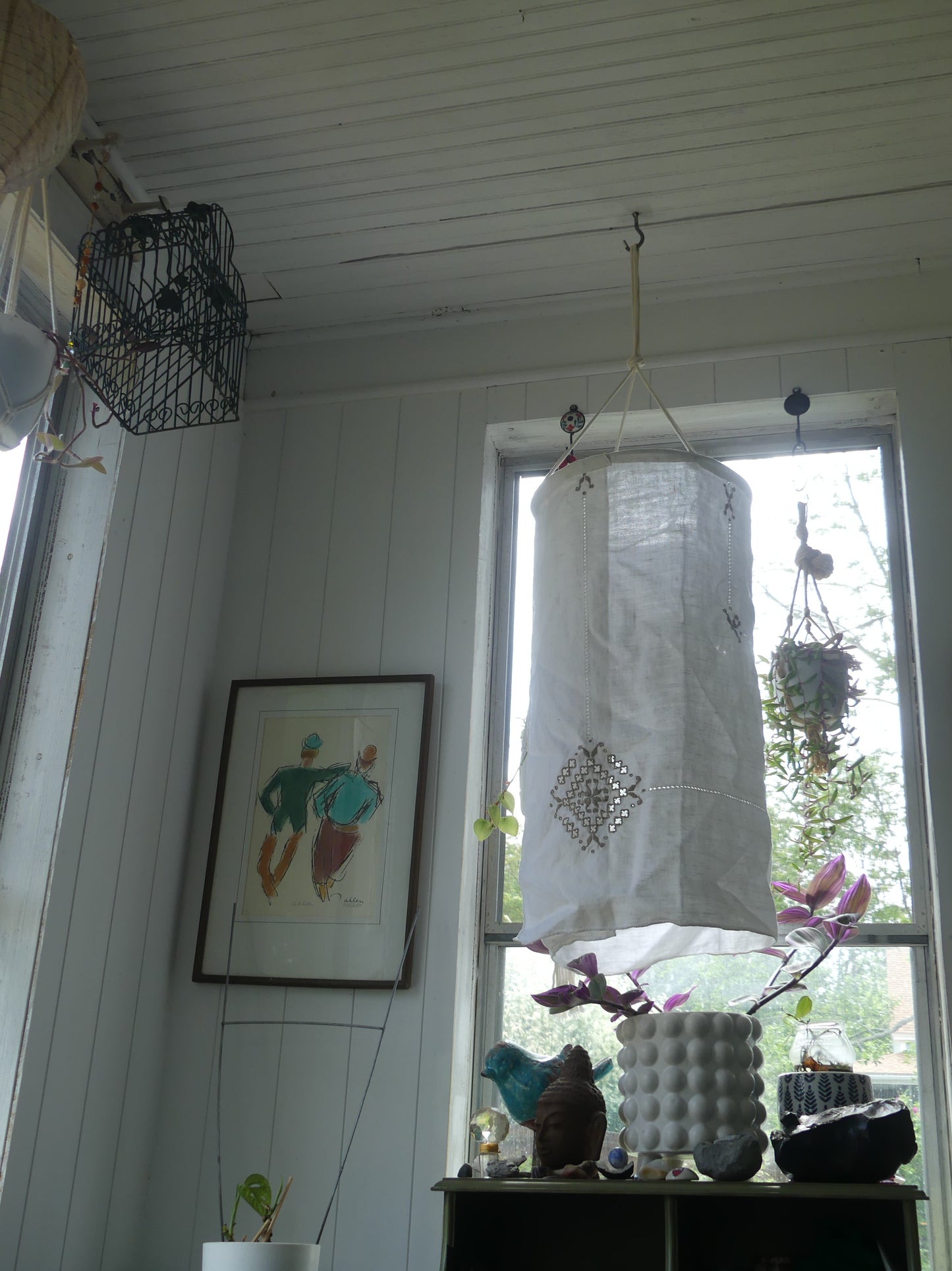 White linen lantern with tan embroidery detail