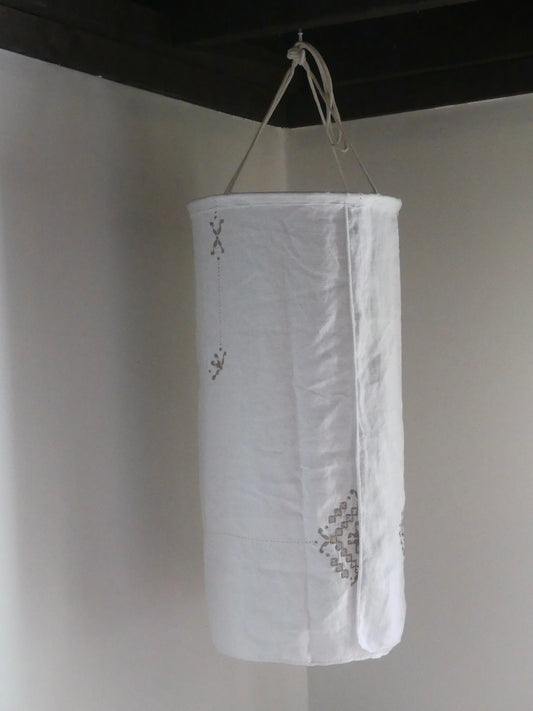 White linen lantern with tan embroidery detail