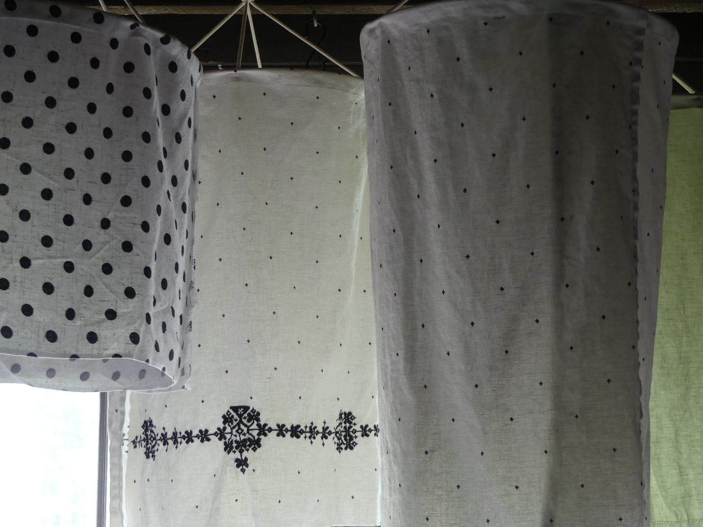 White linen lantern with black embroidery detail